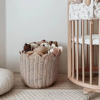Beige handwoven rattan basket with a scalloped edge