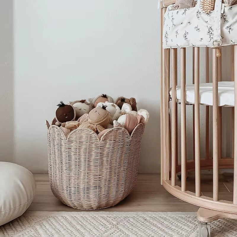 Beige handwoven rattan basket with a scalloped edge
