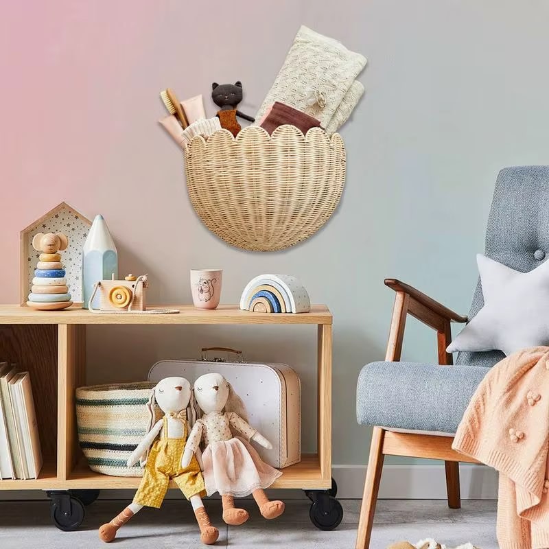 Half moon scalloped rattan wall basket holding plush toys
