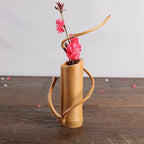 Sculptural bamboo stem vase with curved bamboo branches