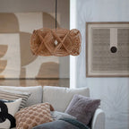 Sculptural openwork rattan pendant with looped strands