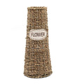 Tapered woven seagrass vase with a Flower label