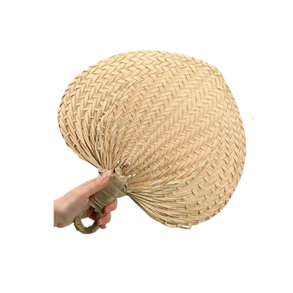 Heart shaped woven hand fans with loop handles set on chairs for a garden wedding