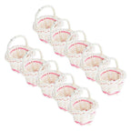 Tiny handwoven basket with handle held between fingers