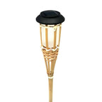 Set of twelve woven rattan solar garden lights on stakes