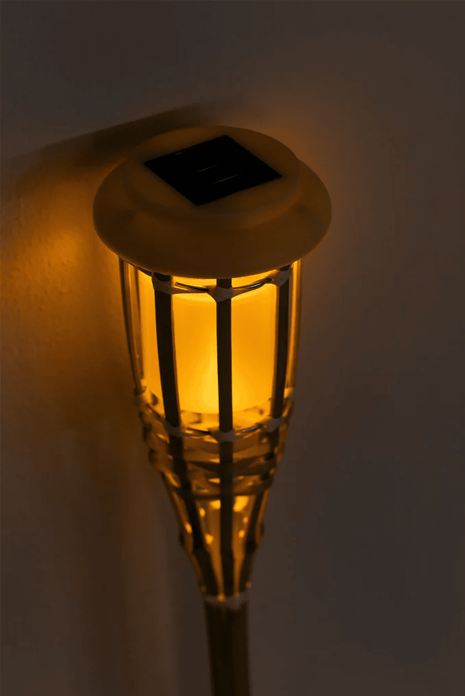 Set of twelve woven rattan solar garden lights on stakes
