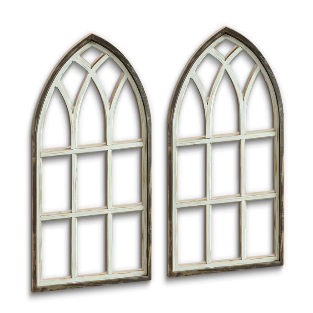 Two arched cathedral style window frames in distressed wood
