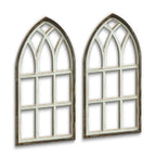 Two arched cathedral style window frames in distressed wood