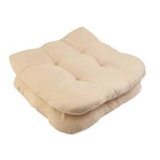 Two thick beige polyester seat cushions with ties for rattan chairs