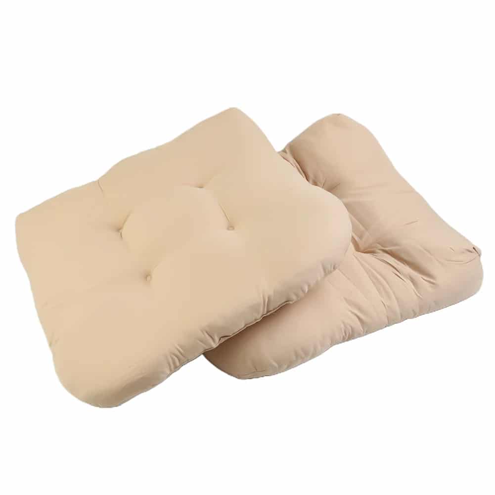 Two thick beige polyester seat cushions with ties for rattan chairs