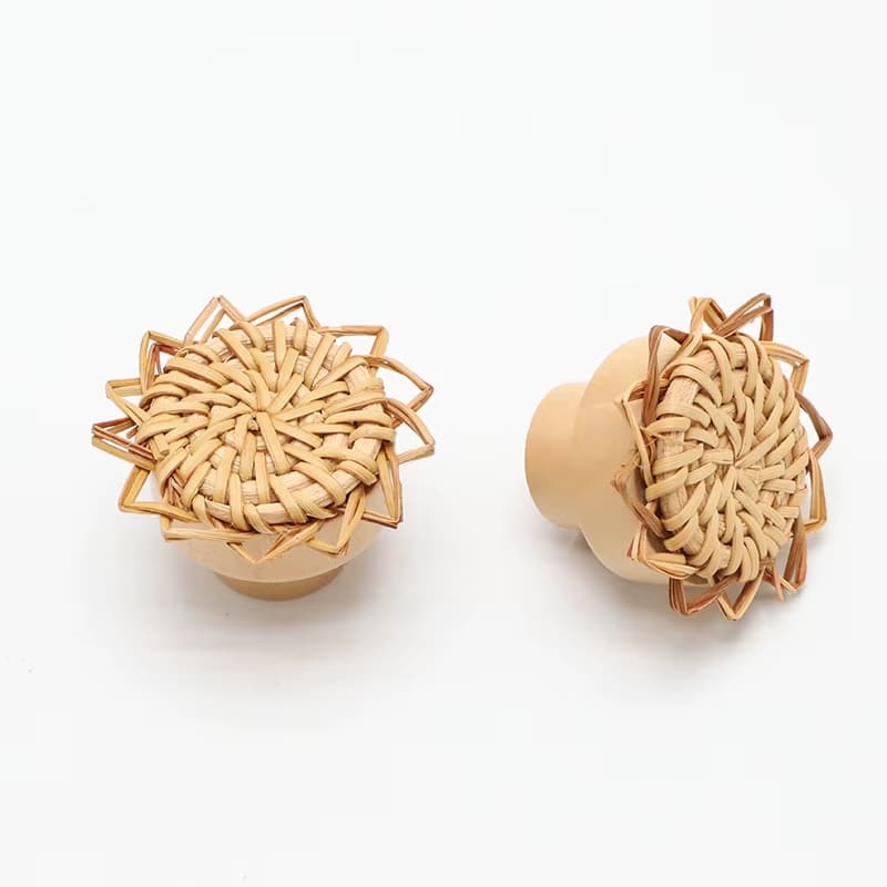 Two small flower shaped hand woven rattan furniture knobs