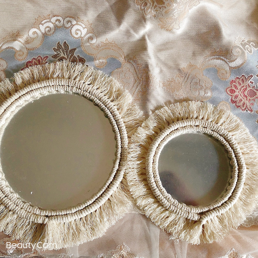 Two round mirrors with white macrame fringe frames