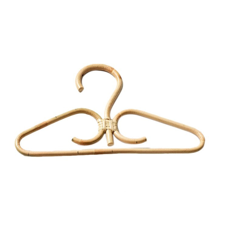 Two hand woven rattan clothes hangers with gold metal hooks and inner hooks