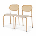 Two vintage hand woven wicker chairs with rounded backs and padded seats