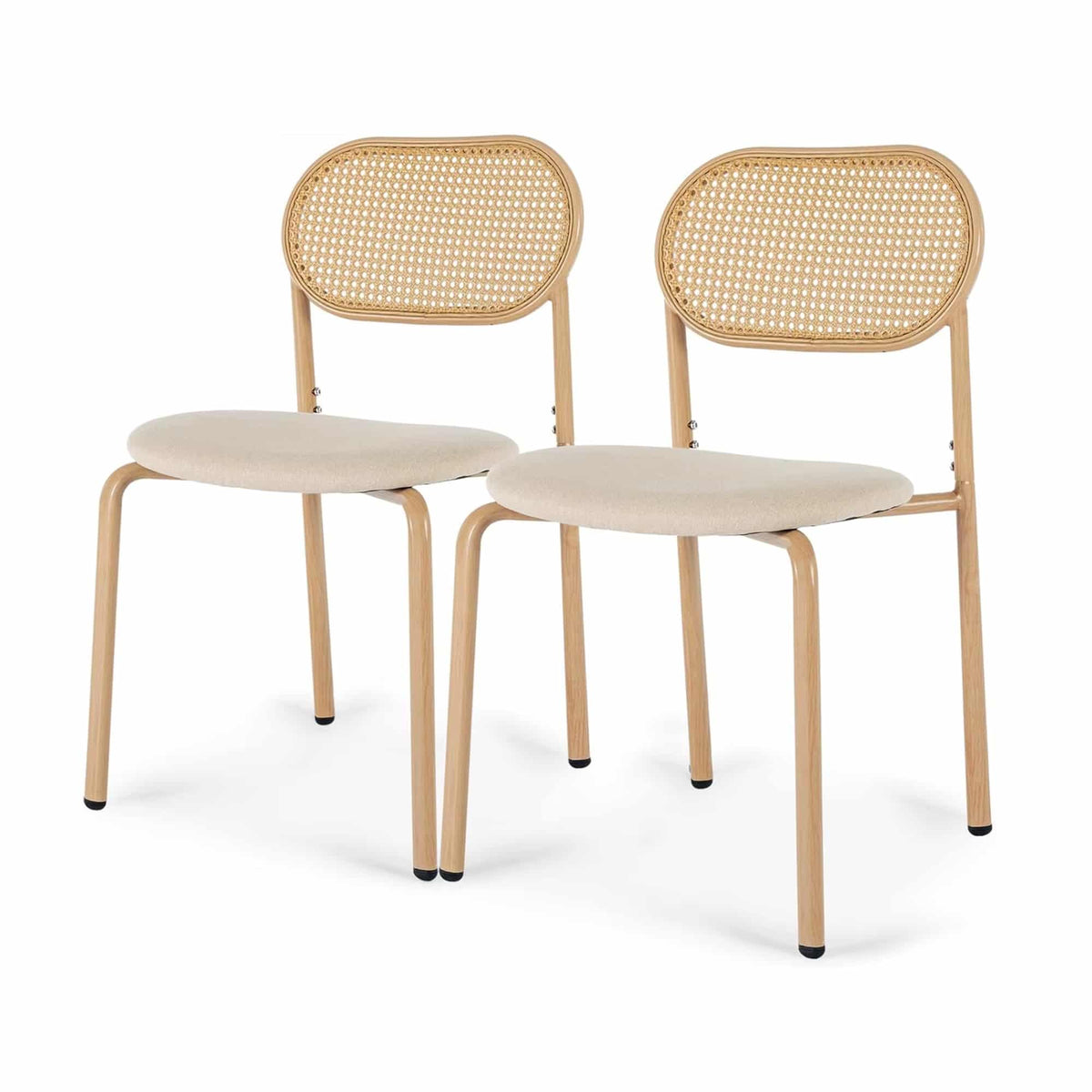 Two vintage hand woven wicker chairs with rounded backs and padded seats
