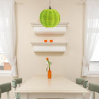 Two small woven clip on bulb shades in green or white