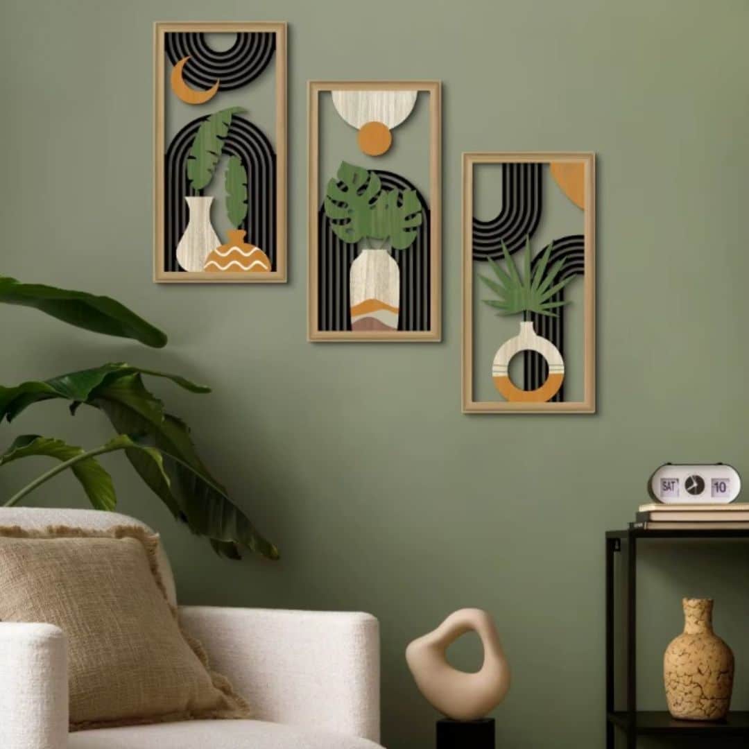 Three framed layered wood wall art panels with arches and leaves