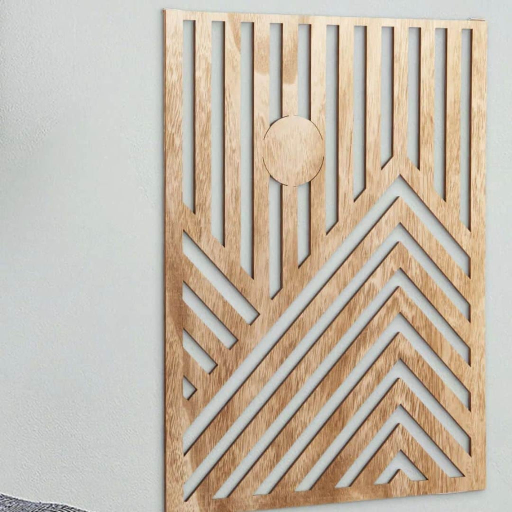 Three overlapping geometric cut out wood wall panels