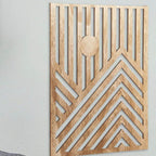 Three overlapping geometric cut out wood wall panels