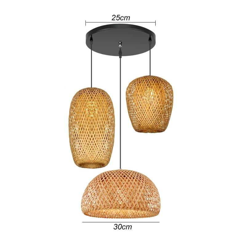 Three woven rattan pendants of different shapes hung as a cluster