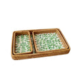 Set of three handwoven rattan trays with woven leaf pattern
