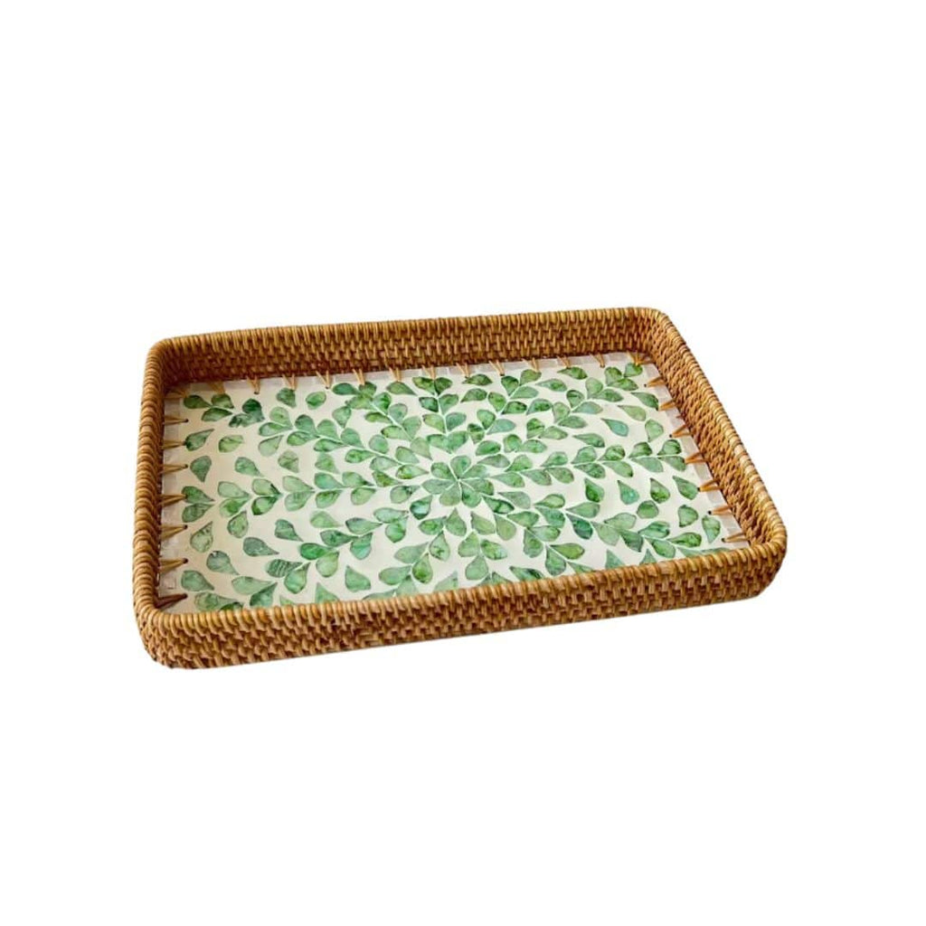 Set of three handwoven rattan trays with woven leaf pattern