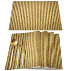 Four beige placemats with a woven bamboo look and interlaced patterns