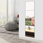 Four square acrylic mirror panels stacked into a full length mirror