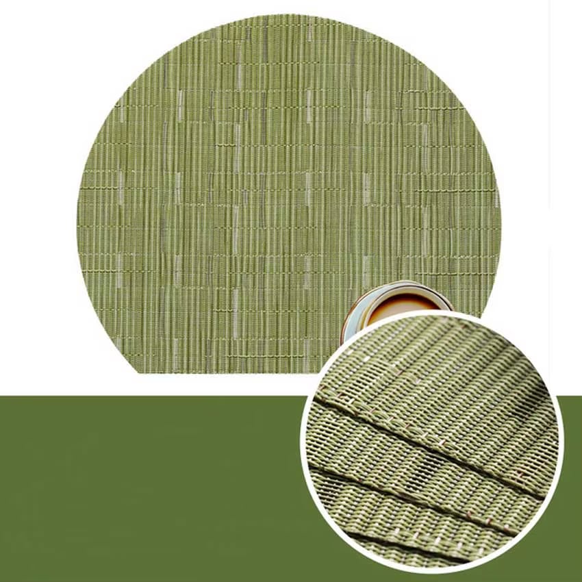 Four semi round green woven bamboo placemats