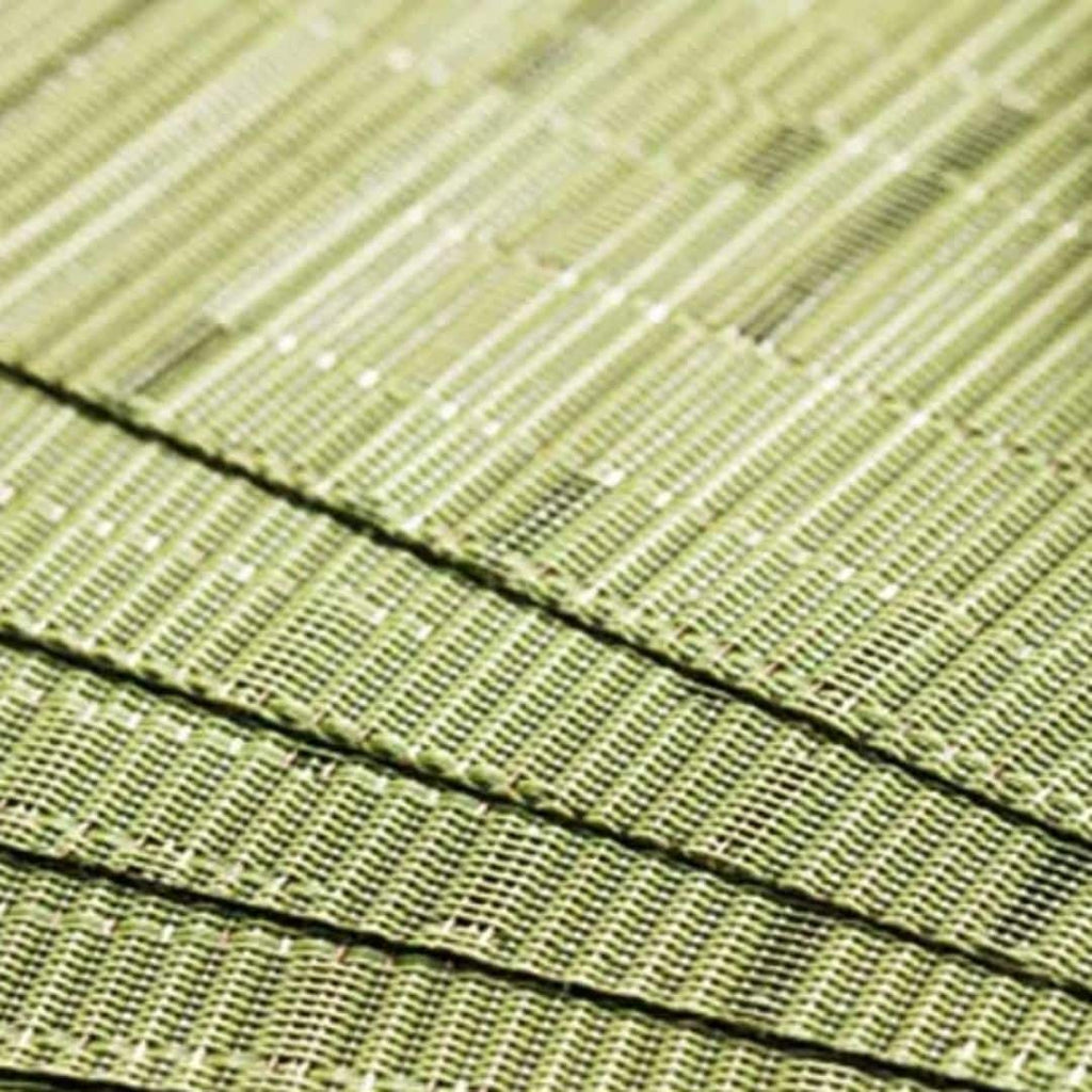 Four semi round green woven bamboo placemats