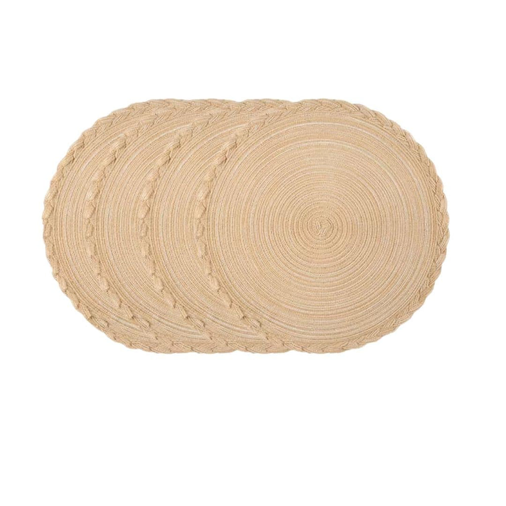 Four round Japanese style placemats with a regular woven straw look