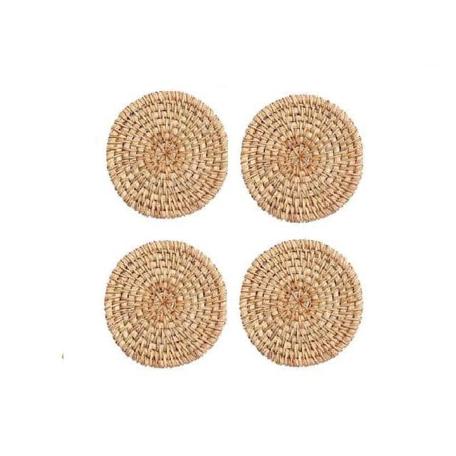 Set of four round hand woven natural rattan coasters