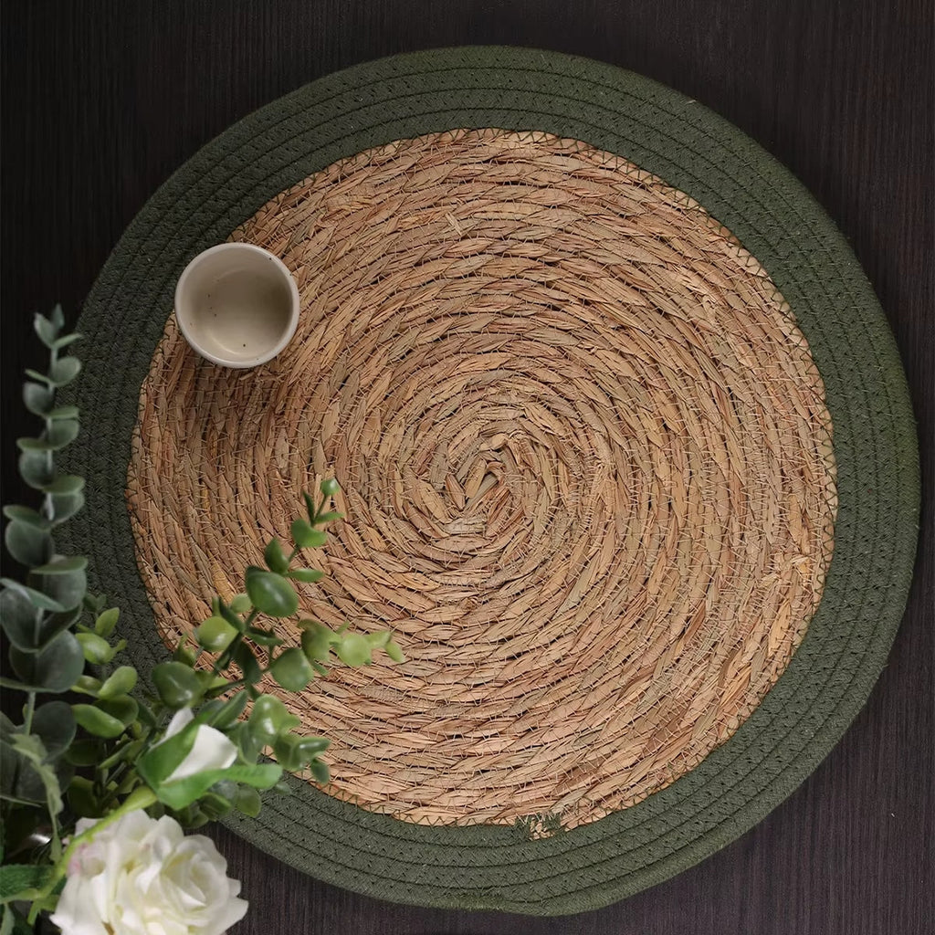 Four round vintage placemats hand woven in golden natural straw