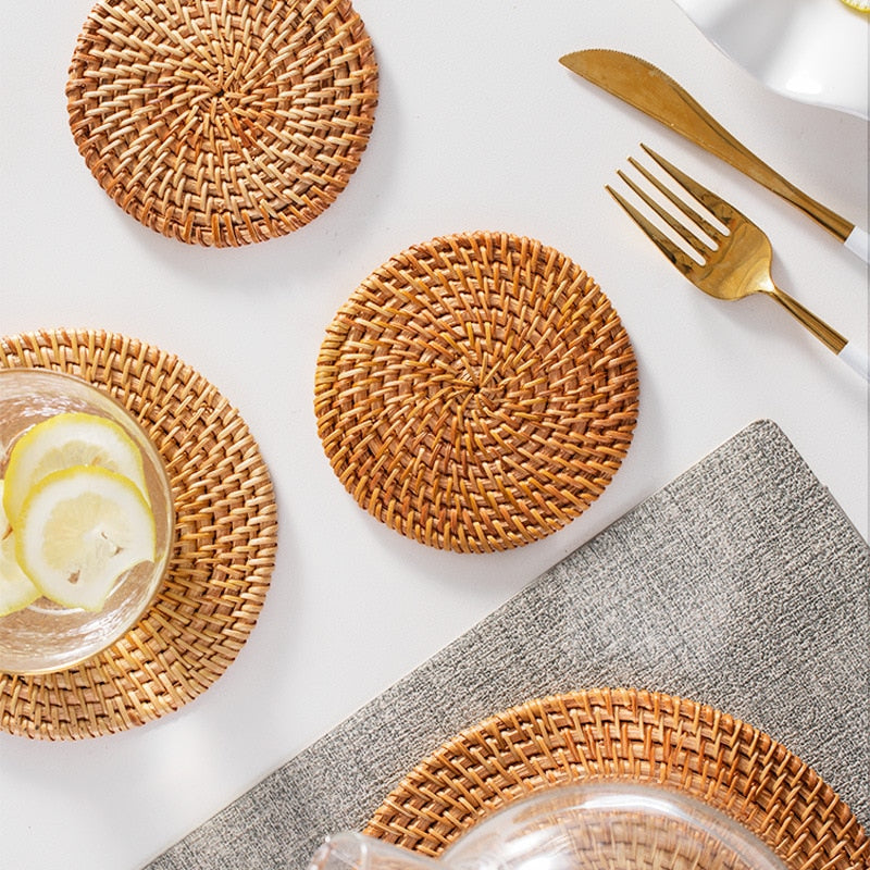 Set of six round hand woven natural rattan coasters
