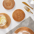 Set of six round hand woven natural rattan coasters