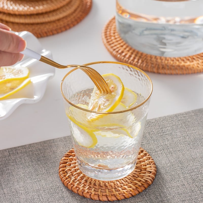 Set of six round hand woven natural rattan coasters