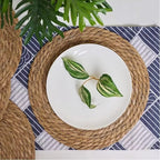 Six round hand braided beige straw placemats