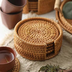 Set of six round hand woven natural rattan coasters