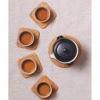 Set of six thick hand woven rattan drink coasters