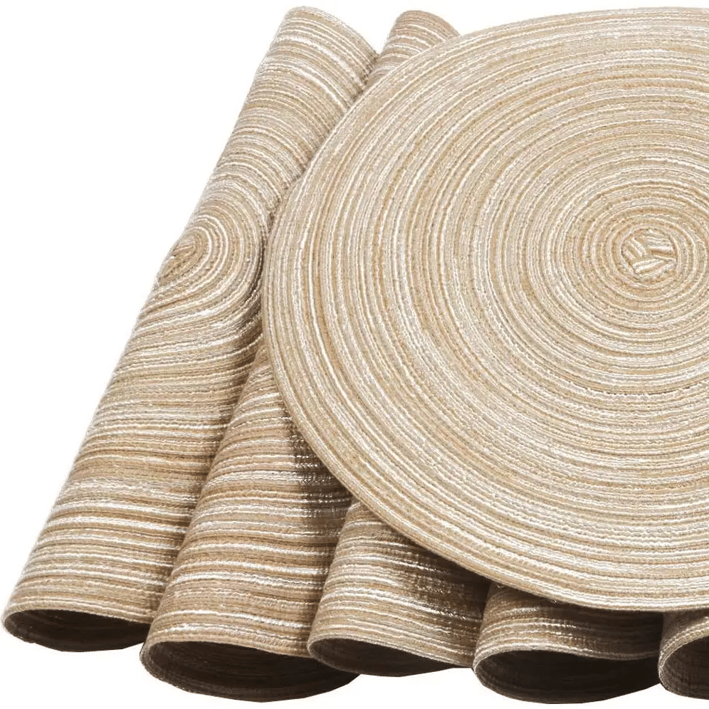 Six round beige coasters with a woven rattan look