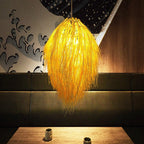 Tall shaggy natural fringe rattan chandelier