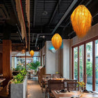 Tall shaggy natural fringe rattan chandelier