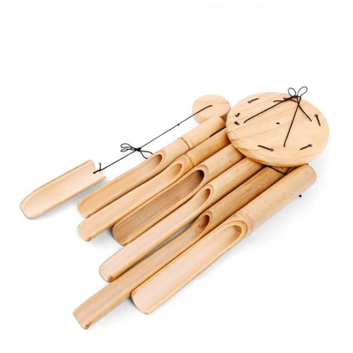 Natural bamboo wind chime with six tubes around a central striker