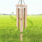 Natural bamboo wind chime with six tubes around a central striker