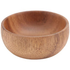 Small round acacia wood bowl with a visible natural grain