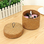 Small round woven straw basket with lid holding cosmetics