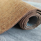 Small natural fiber flatweave rug in a living room