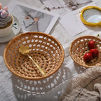 Small round open weave rattan bowls on a table