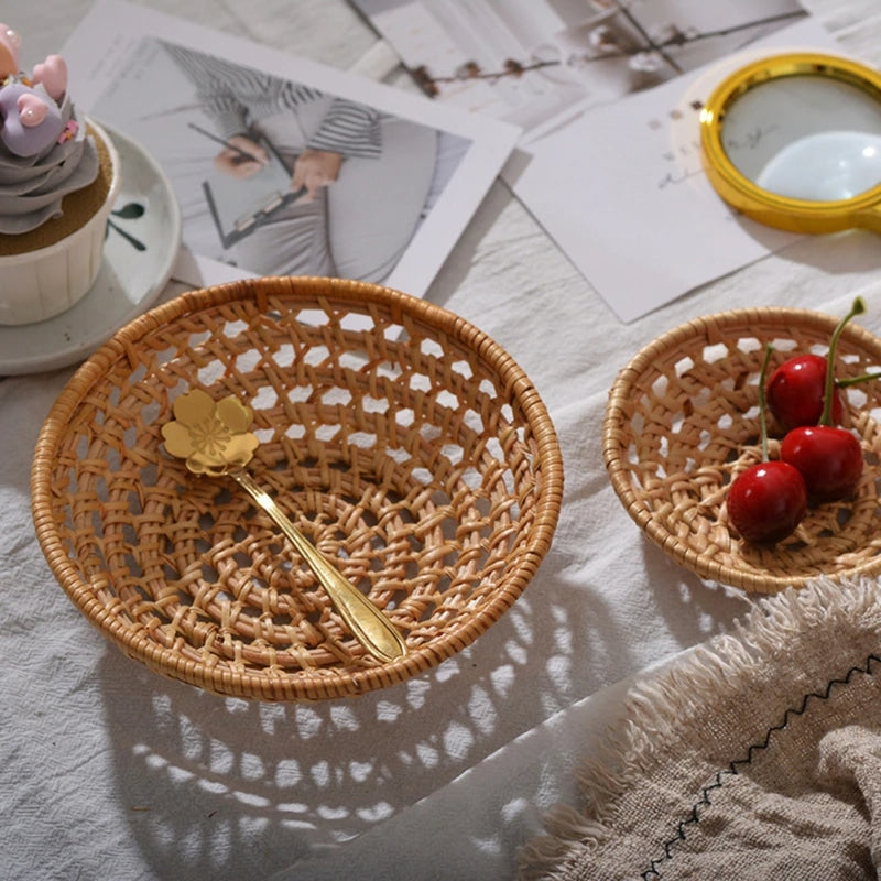Small round open weave rattan bowls on a table