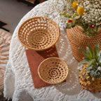 Small round openwork rattan bowls on a table